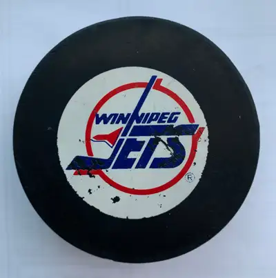 Winnipeg Jets &  Carolina Hurricanes Pucks, View more