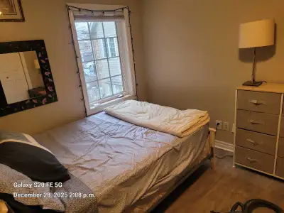 Beautiful room, beautiful house on walking trail! 1 dog on premises. Laundry on site. Parking availa...