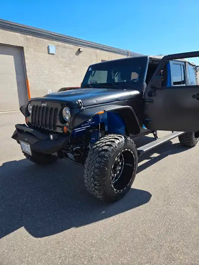 Testing the waters. Beautiful jeep with many upgrades with low km for the year. A definite must see....