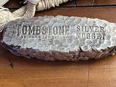 The 10 oz Tombstone Silver Bar captures the rugged spirit of the Old West in bold bullion form. Stru...