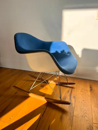 Eames RAR Chair circa 1975. Parchment fibreglass shell and bright blue Alexandre Girard upholstery,...