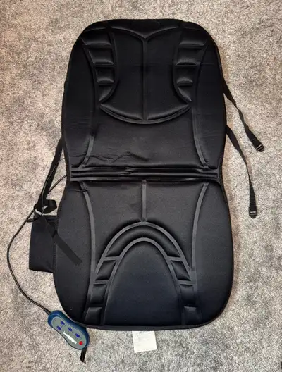 Selling a Massage Cushion seat with vibrating and heat. Can work in chair or car. Good condition. Se...