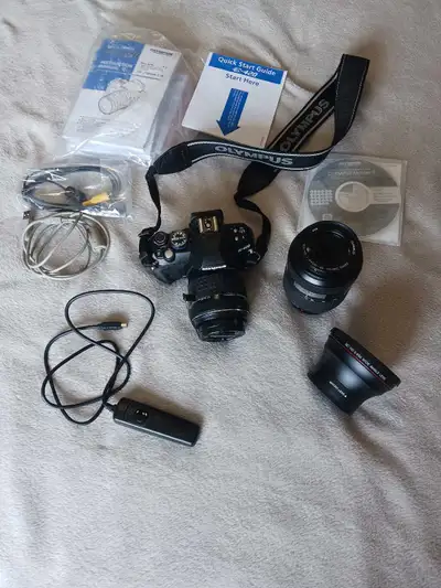 Digital SLR camera package like new. Package includes: Olympus E-420 body. Zuiko Digital 17.5-40mm f...
