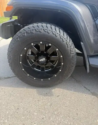 18” Moto Meta rims and tires. Off a 2018 jeep wrangler . Do fit dodge rams as well. Bought used but...