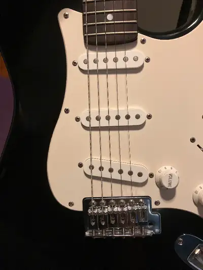 A 1996 squier se. recently setup to medium action . Good modding platform, Minimal fret wear, no buz...