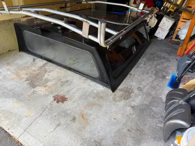 2 year old leer fiber glass cap from a 2023 ram 1500 classic with a 6’4 box, some dings and scratche...