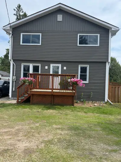 3-bedroom, 1-bath home situated on a large 106x100 ft fully fenced town lot, featuring a very large...
