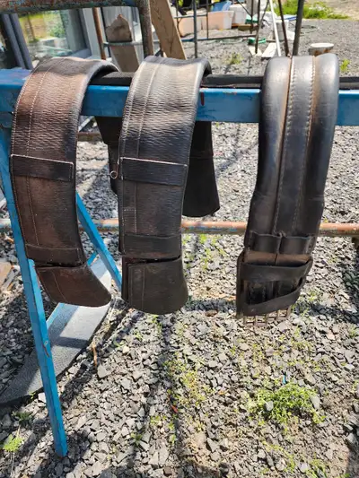 Usable older leather elastic dressage girth. Size 26". $25. 2 each made in england leather girths. B...