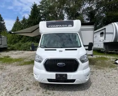 This 2023 Thor Motor Coach Compass 23TW is in excellent condition. Featuring a sleek white exterior,...