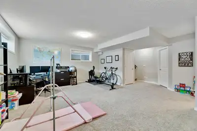 This house in New Brighton SE Calgary offers quality and upgrades. Main floor hardwood, living room...