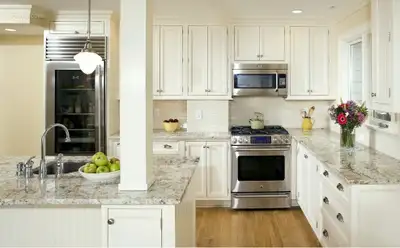 Maple Wood Kitchen Cabinetry with Granite Countertops, View more