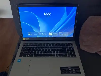 Wiped and ready for a new home Used for college for a year Comes with charger Has some scratches on...