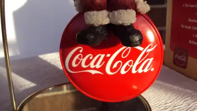 2006 Boyds Bears - Coca-Cola Holiday Ornament. Measures 5 inches high. Has box.