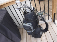 right hand golf clubs  and cart, bag ,and  balls ......175.00