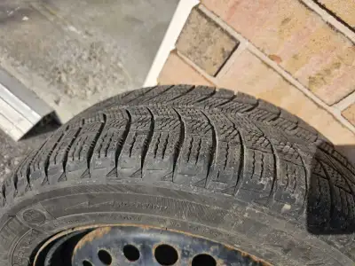 4 Michelen XI3 205 55 R16 winter tires on steel rims with origional Honda TPMS sensors inside Bolt p...
