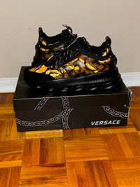 Versace chain reaction black and gold size 11.5