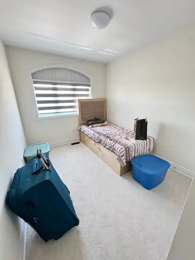 Private large room with bed and closet available for rent for female only in a brand new semi-detach...