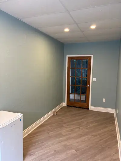 Available to sublet within commercial unit. Space is 100 Sq/feet, linoleum floors, brightly lit, 4 e...