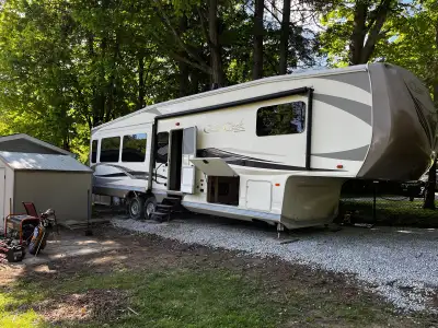 We are selling our 2016 Cedar Creek CKTS fifth wheel trailer. It is 39’10” with three slide-outs. We...