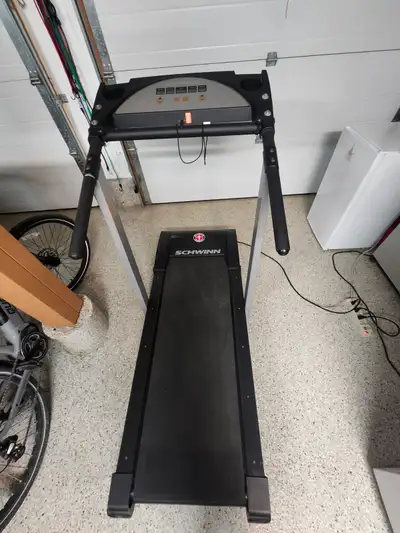 Heavy duty Schwinn treadmill for sale by owner. Has various speeds, slope grades, and speed and dist...