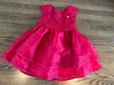 In excellent condition, adorable girls/toddler red dress in size 3. Dress is lined. Pick up near Ass...