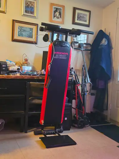 FREE. Large workout bench. Moved into seniors' apartment. No room to open it, almost 7 feet long. Mu...