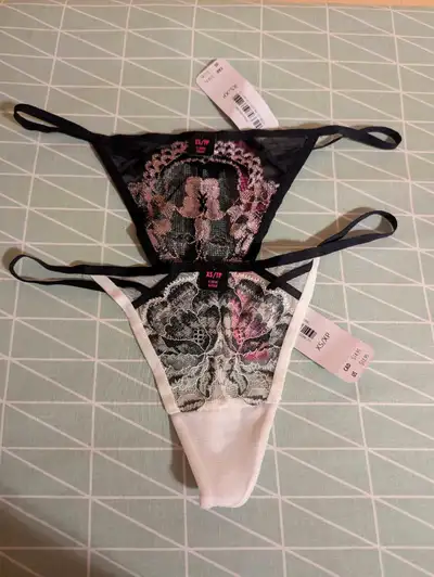 I'm offering two pairs of brand-new La Senza XS/TP thongs. These feature delicate lace designs and a...