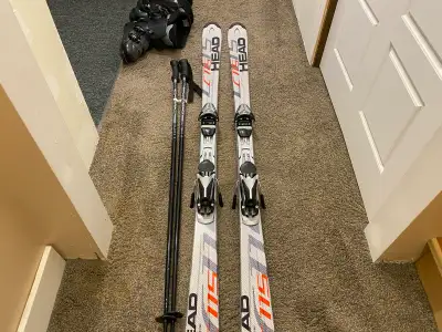 Downhill skis boots and poles. , View more