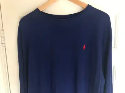 Rarely worn lightweight blue sweater in very good condition. 100% cotton. No rips or tears. Pick up...