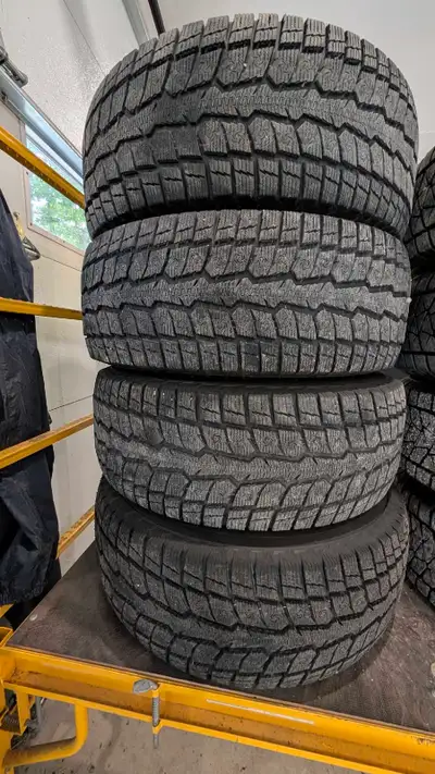 pre-owned Toyo Observe GSi-6 LS winter tires with steel wheels and wheel covers. Tires 265 70 R17. W...