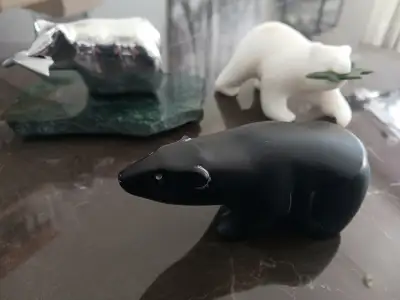 I have 3 bears for sale. -White marble with Jade salmon. Includes box and certificate. -Black stone...