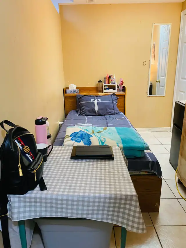 BSMT PRIVATE  ROOM WITH private TOILET FOR RENT –FEMALE only