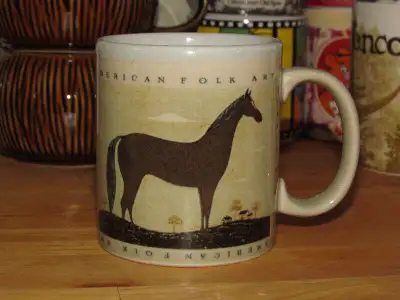 A great looking Warren Kimble ‘American Folk Art’ HORSE coffee cup. The cup measures approximately 3...