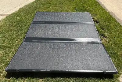 I'm selling a folding hard tonneau cover for a Ford truck with a 5’6” bed. This cover is used but st...