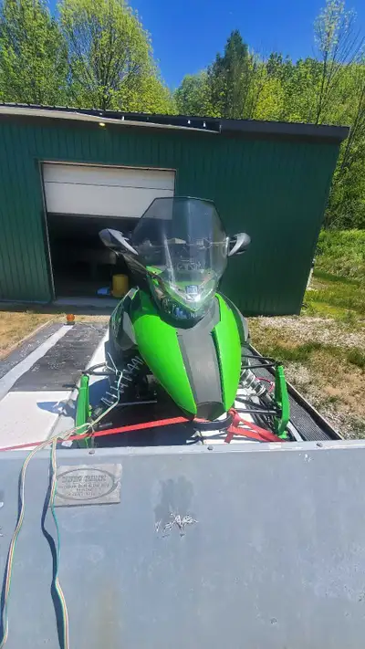 Snowmobile in decent to good shape Currently jack shaft barring is broken Heated seat, hand, thumb S...