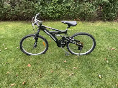 This is a Supercycle Hooligan ST mountain bike in good used condition — perfect for kids or smaller...
