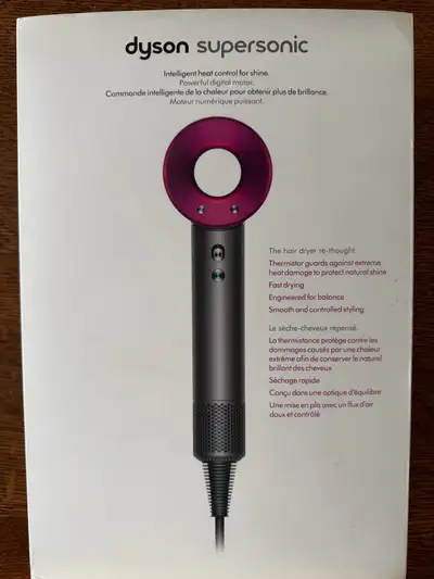 Treat your hair to the innovative Dyson Supersonic hair dryer, engineered for fast drying and intell...