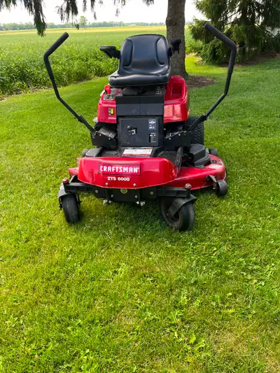 52” cut 26hp Briggs and Stratton motor runs and cut excellent, no hour meter Newer battery blades an...