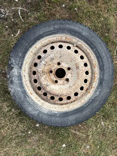 Qty 4 - Continental Winter Contact 215/55 R16 tires on steel rim. Rim have rust on them and have mud...