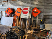 Road signs and barrels 