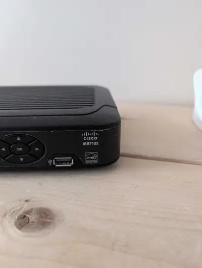 This used Cisco ISB7105 is a digital set-top box perfect for streaming your favourite TV shows and m...
