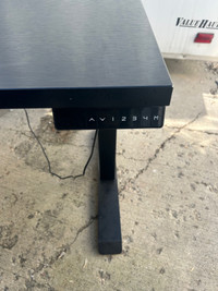 Electric height adjustable work desk 