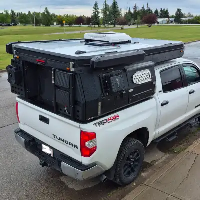This is the Pro package and it's fully loaded for a 5.5 ft truck bed. 450 watts of solar, dual zone...