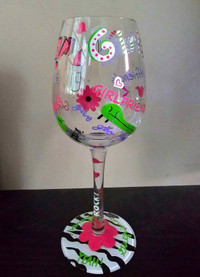 Girlfriend wine glass with drink recipe on the bottom.