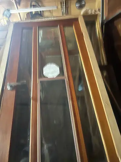 Cedar storm door c/w door knob,  casing / frame , View more