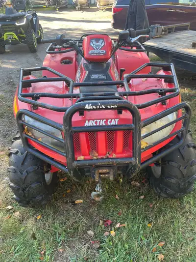 2006 Arctic Cat 650 ATV running and driving. Has a click in the axles. Selling as is.