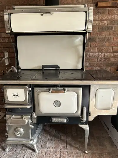 Great condition wood burning cook stove. All accessories are included, including a never used water...