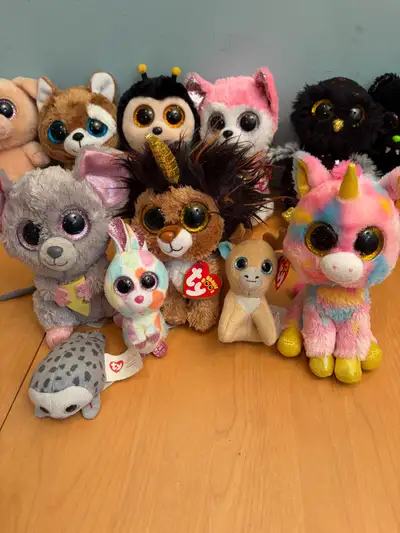 Spruce up your plush collection with these adorable Ty Beanie Boos, each boasting those signature, h...