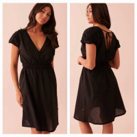 New with tags black cotton dress in size Large.