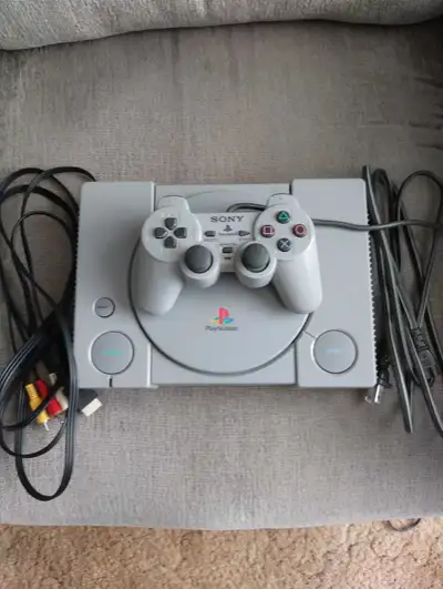 PlayStation 1 with four games, View more